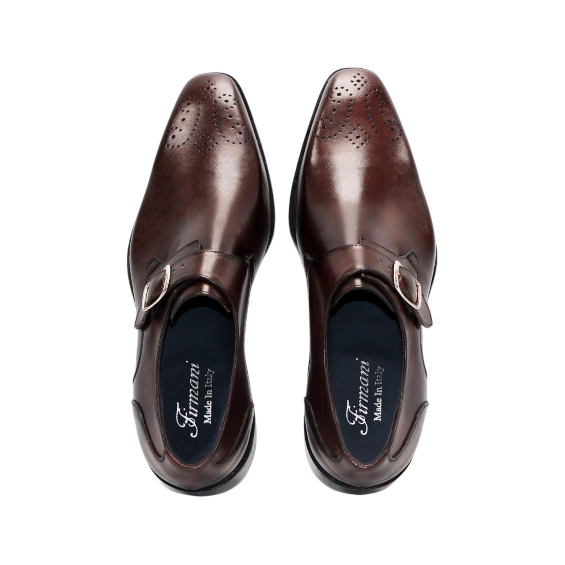 The Firmani Duncan Chocolate men's dress shoe features brown Italian leather, a silver buckle, and perforated detailing, displayed in side profile on a white background.