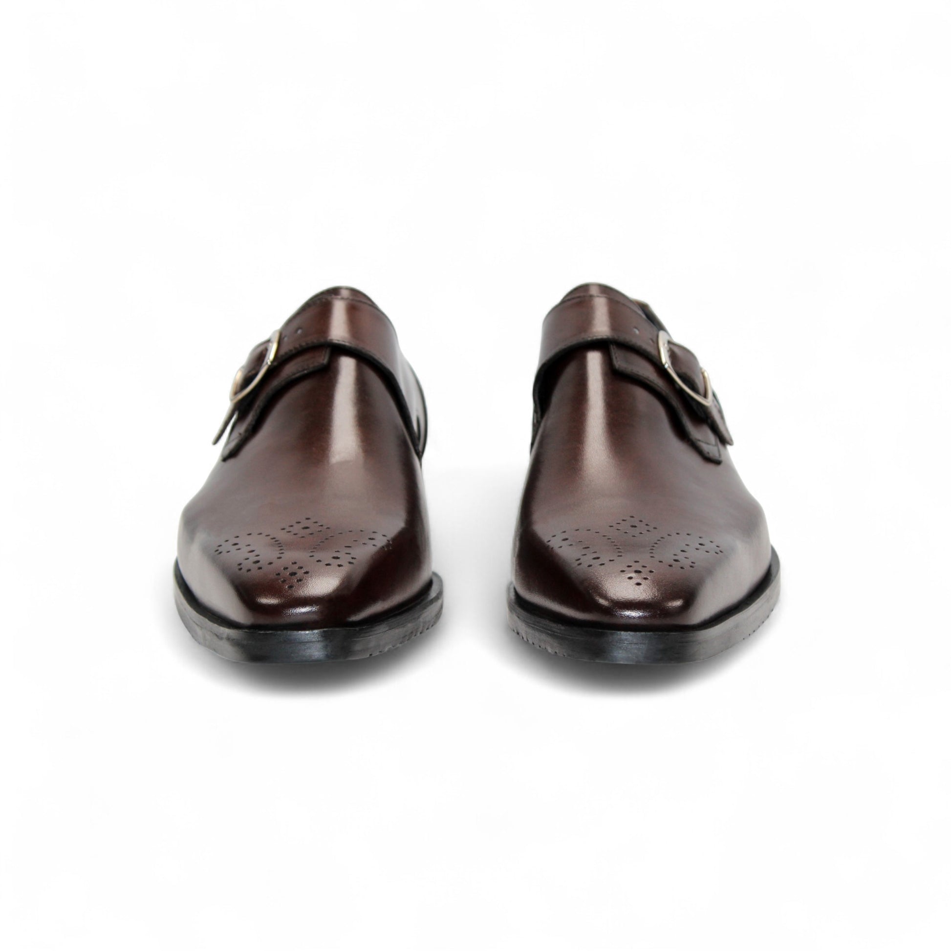 The Firmani Duncan Chocolate men's dress shoe features brown Italian leather, a silver buckle, and perforated detailing, displayed in side profile on a white background.