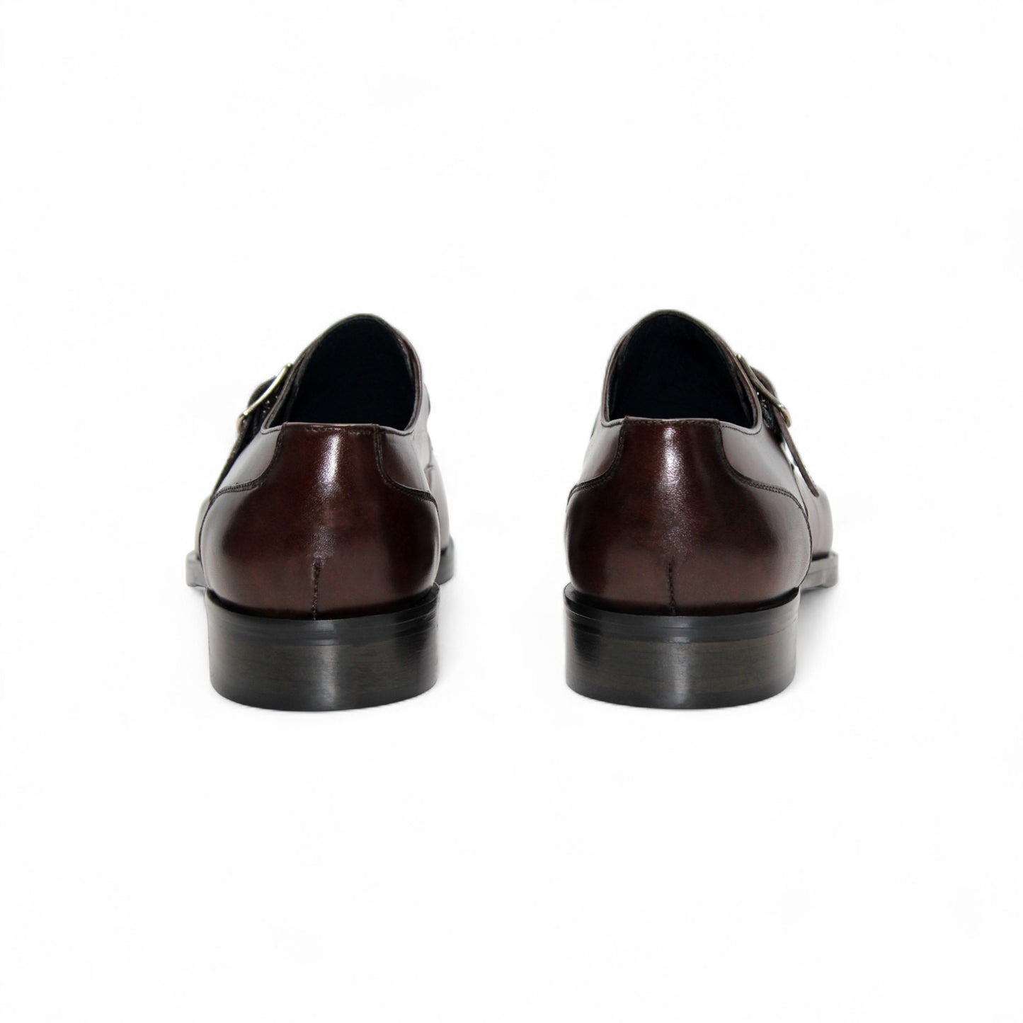 The Firmani Duncan Chocolate men's dress shoe features brown Italian leather, a silver buckle, and perforated detailing, displayed in side profile on a white background.