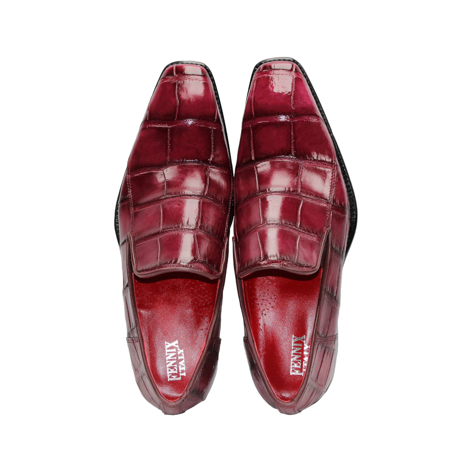 The Fennix Dustin Bordo by Fennix of Italy is a single burgundy loafer in genuine alligator leather with a crocodile pattern, leather sole, and low black heel, displayed on a white background.