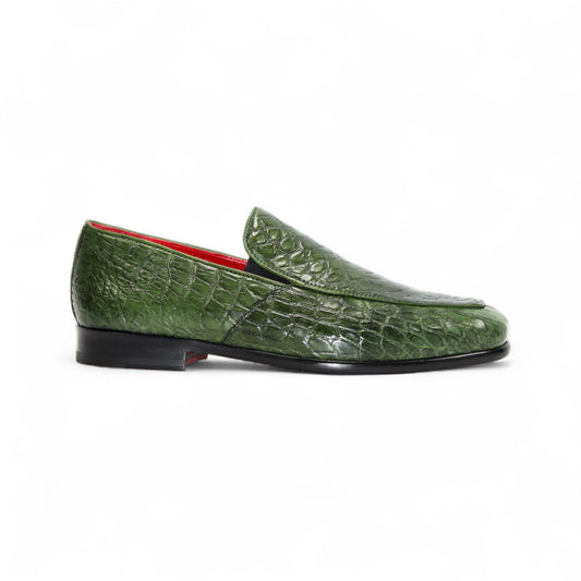 The Fennix of Italy Fennix Easton Green is a green crocodile-patterned leather loafer with Italian craftsmanship, a black sole, and red interior, displayed in side profile on a white background.