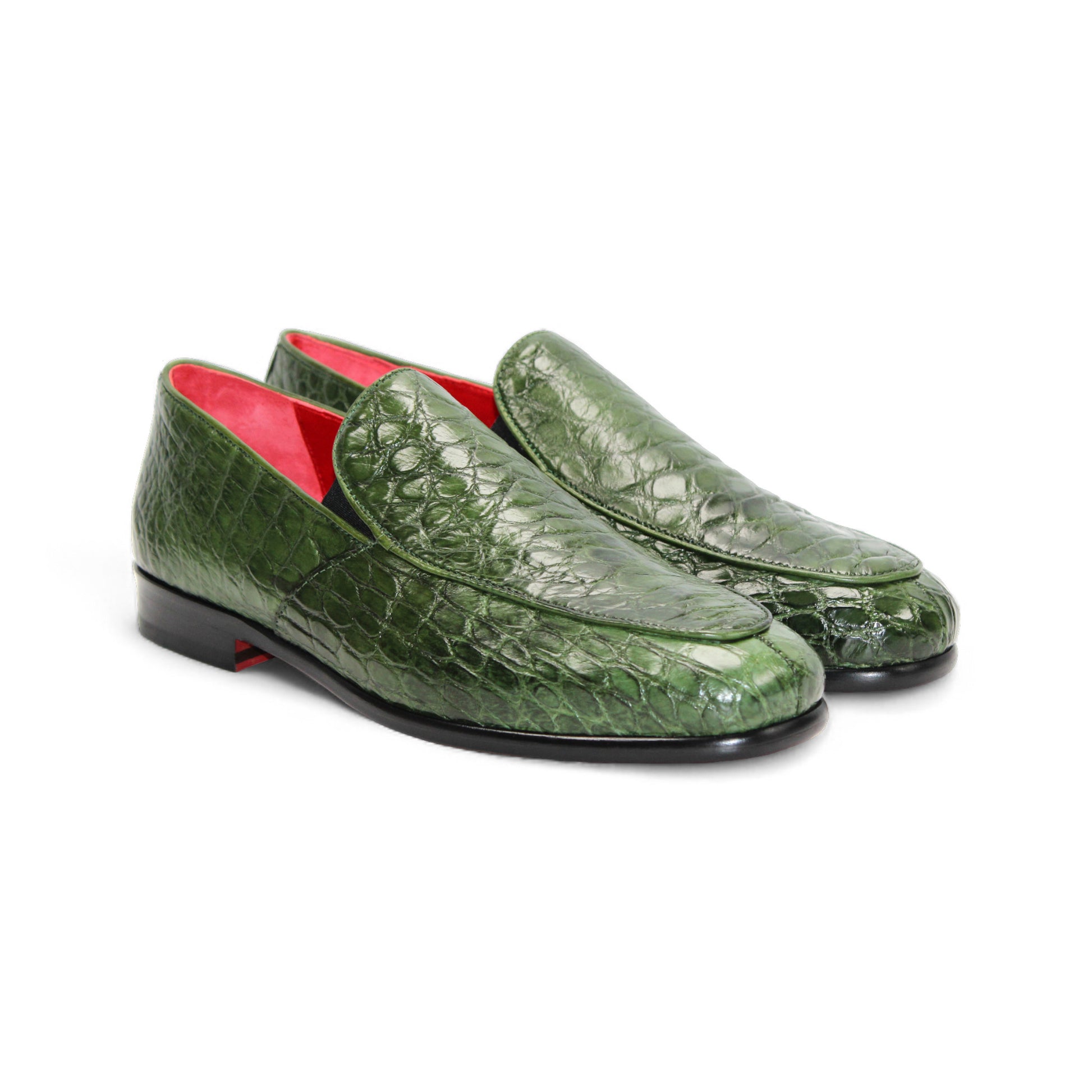 The Fennix of Italy Fennix Easton Green is a green crocodile-patterned leather loafer with Italian craftsmanship, a black sole, and red interior, displayed in side profile on a white background.