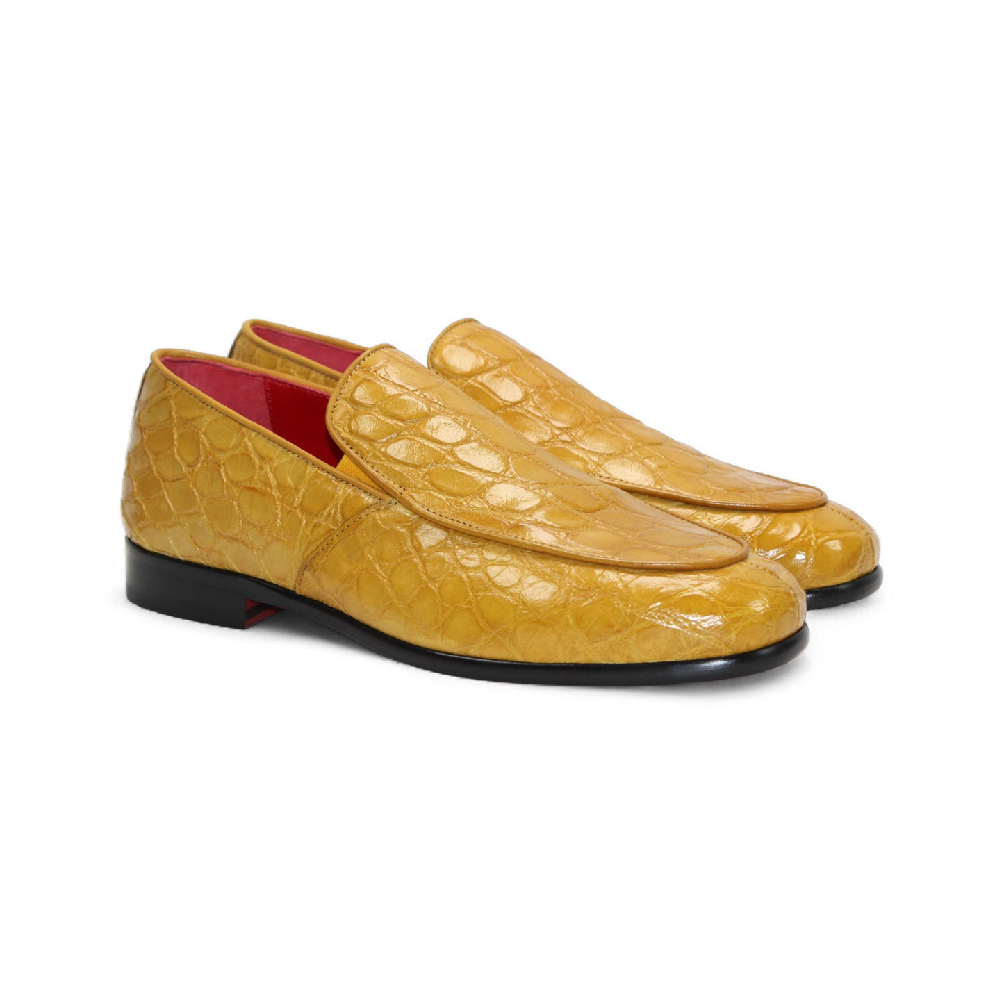 The Fennix of Italy Easton Mustard loafer is a yellow premium crocodile leather shoe with Italian craftsmanship, a black sole, and is shown in profile against a plain white background.