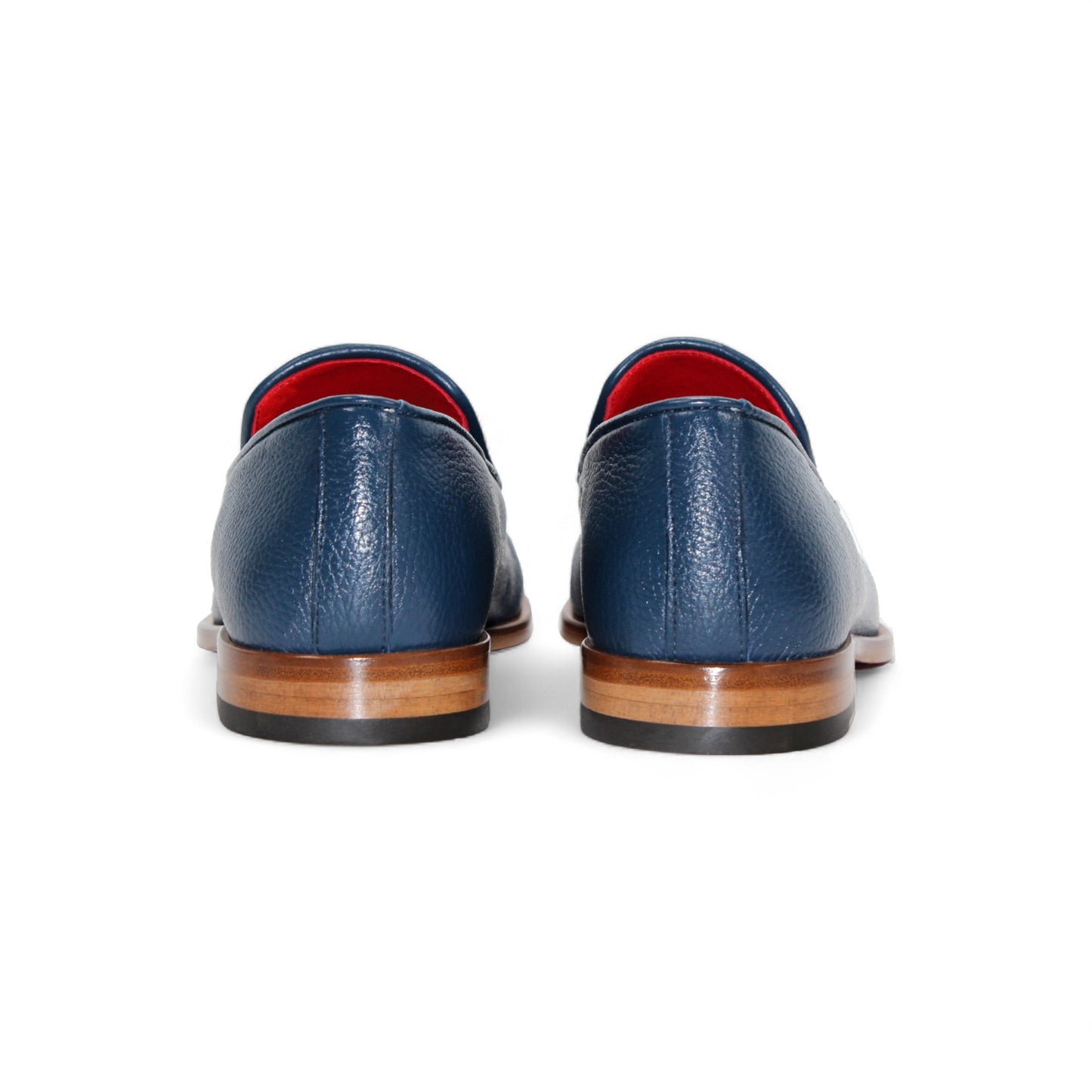 The Emilio Franco Edgardo Jeans is a blue Italian deer skin leather loafer with a wooden sole, metal bit detail, and red interior lining, displayed in profile on a white background. Handcrafted in Italy by Emilio Franco for luxury footwear enthusiasts.