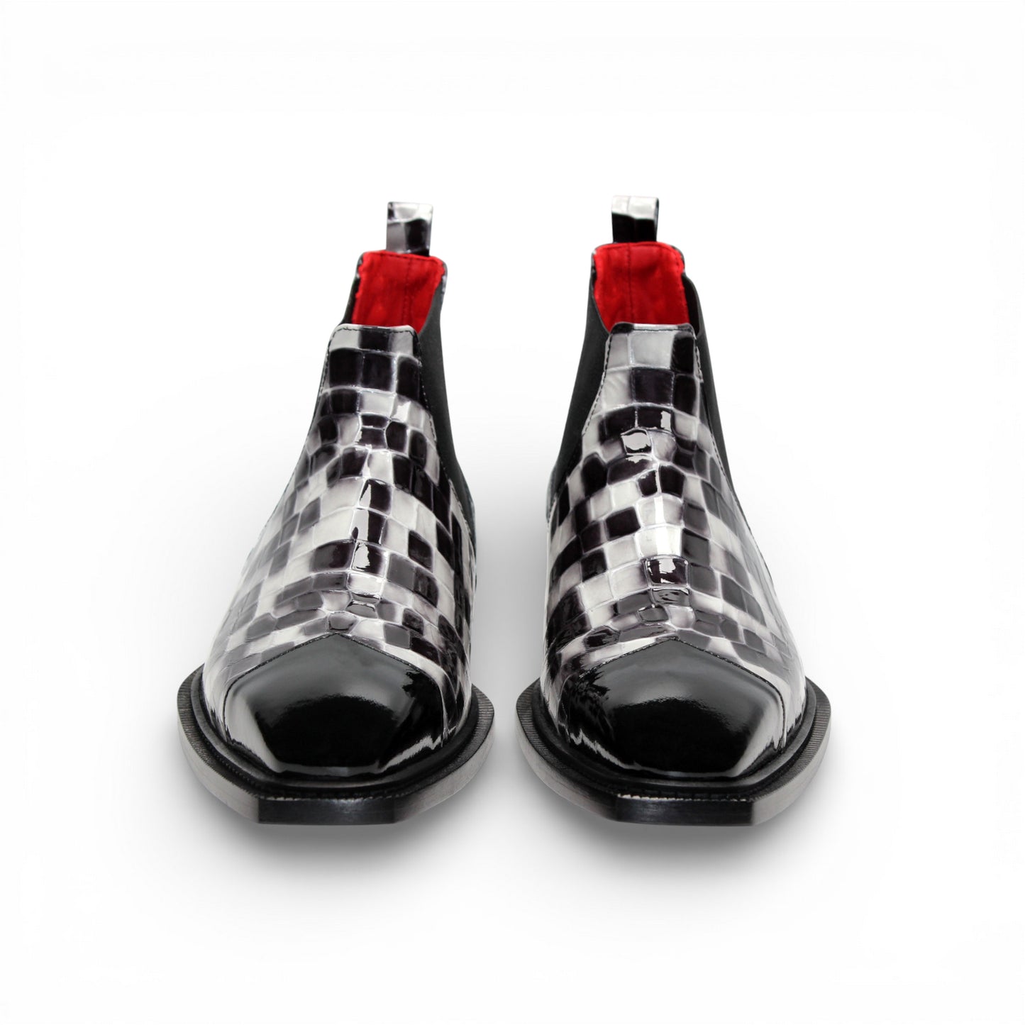The Emilio Franco Couture EFC352 Black/White Chelsea boot features a black and white checkered design, pointed black Italian patent leather toe, black elastic side panel, and low heel—fashion-forward men's footwear by Emilio Franco Couture.