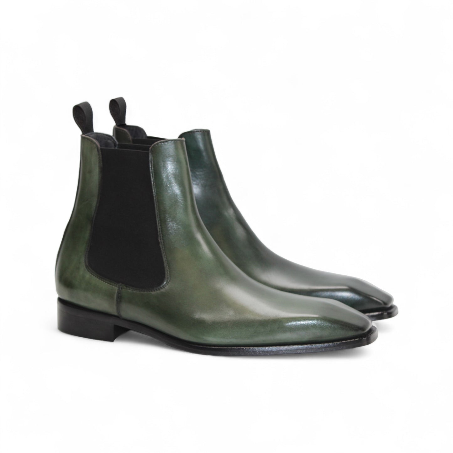 The Duca Empoli Green by Duca Di Matiste is a green genuine leather Chelsea boot with black elastic side panels and a low black heel, shown in side profile on a white background.