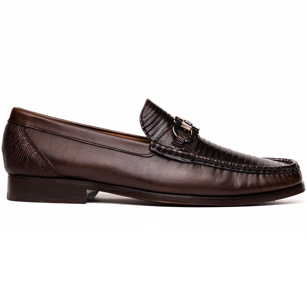 The Enzo Brown by Marco Di Milano features dark brown genuine lizard loafers with textured uppers, a metal buckle, and branded soles—luxurious men's footwear displayed against a white background.