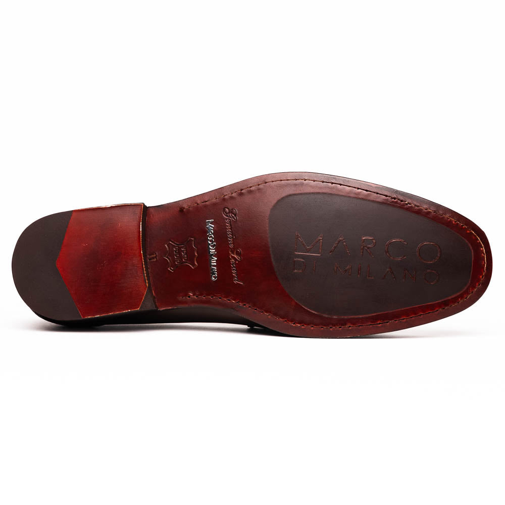 The Enzo Brown by Marco Di Milano features dark brown genuine lizard loafers with textured uppers, a metal buckle, and branded soles—luxurious men's footwear displayed against a white background.