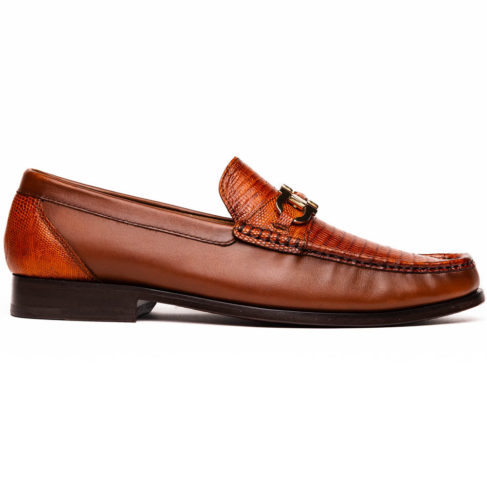 The Enzo Cognac by Marco Di Milano: men's brown leather loafers with a textured pattern, hand-painted finish, gold buckle, and black soles, shown on a white background.