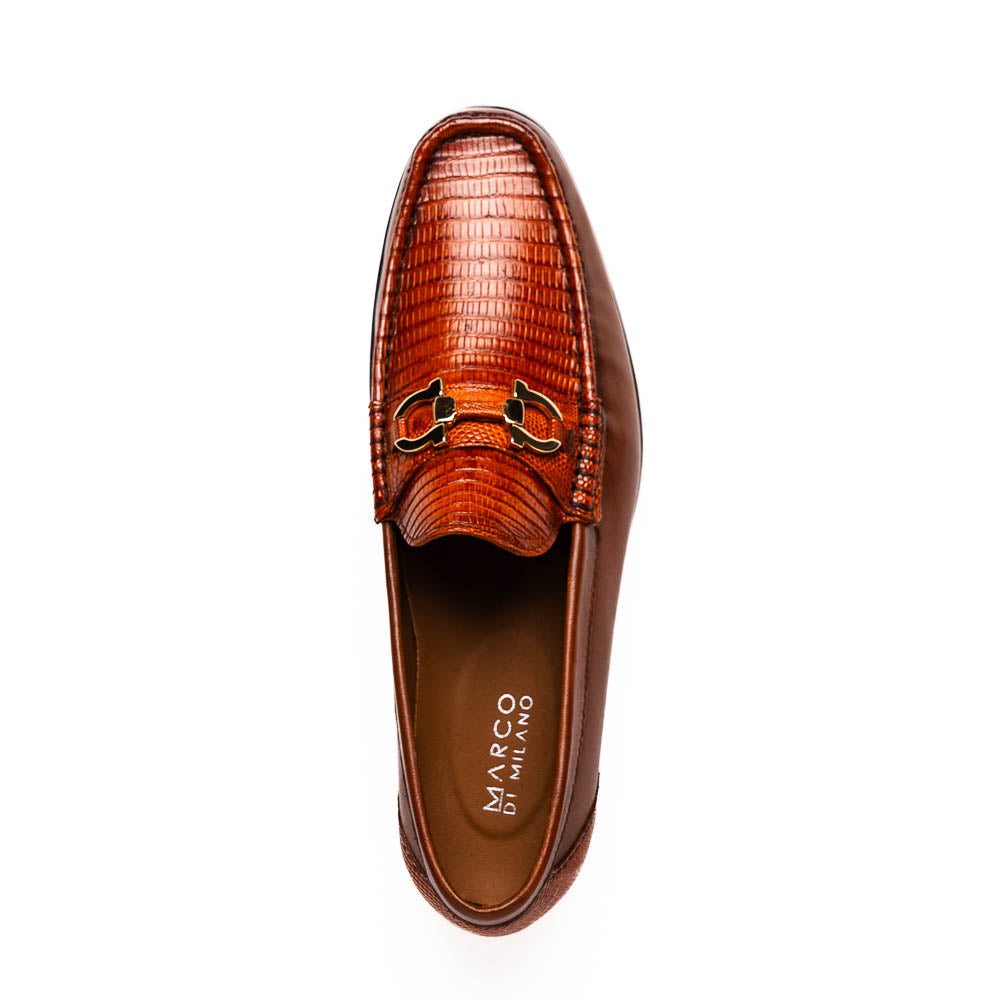 The Enzo Cognac by Marco Di Milano: men's brown leather loafers with a textured pattern, hand-painted finish, gold buckle, and black soles, shown on a white background.