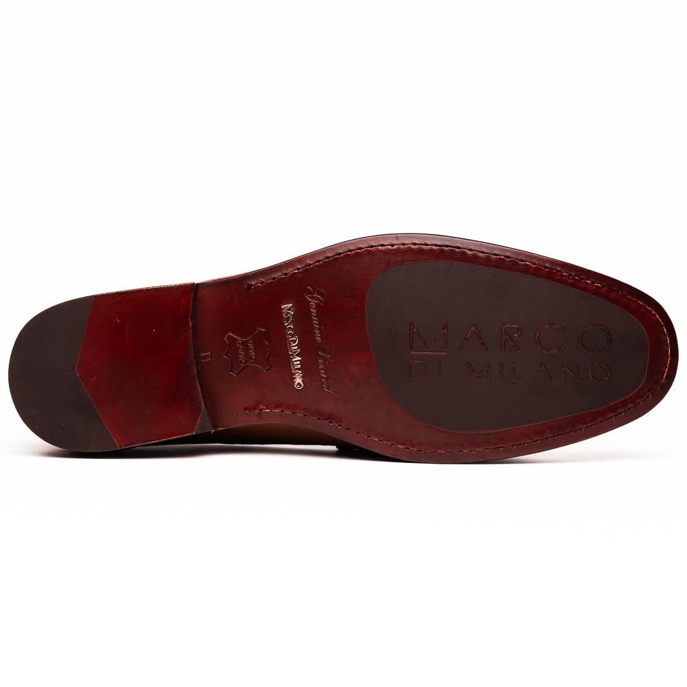 The Enzo Cognac by Marco Di Milano: men's brown leather loafers with a textured pattern, hand-painted finish, gold buckle, and black soles, shown on a white background.