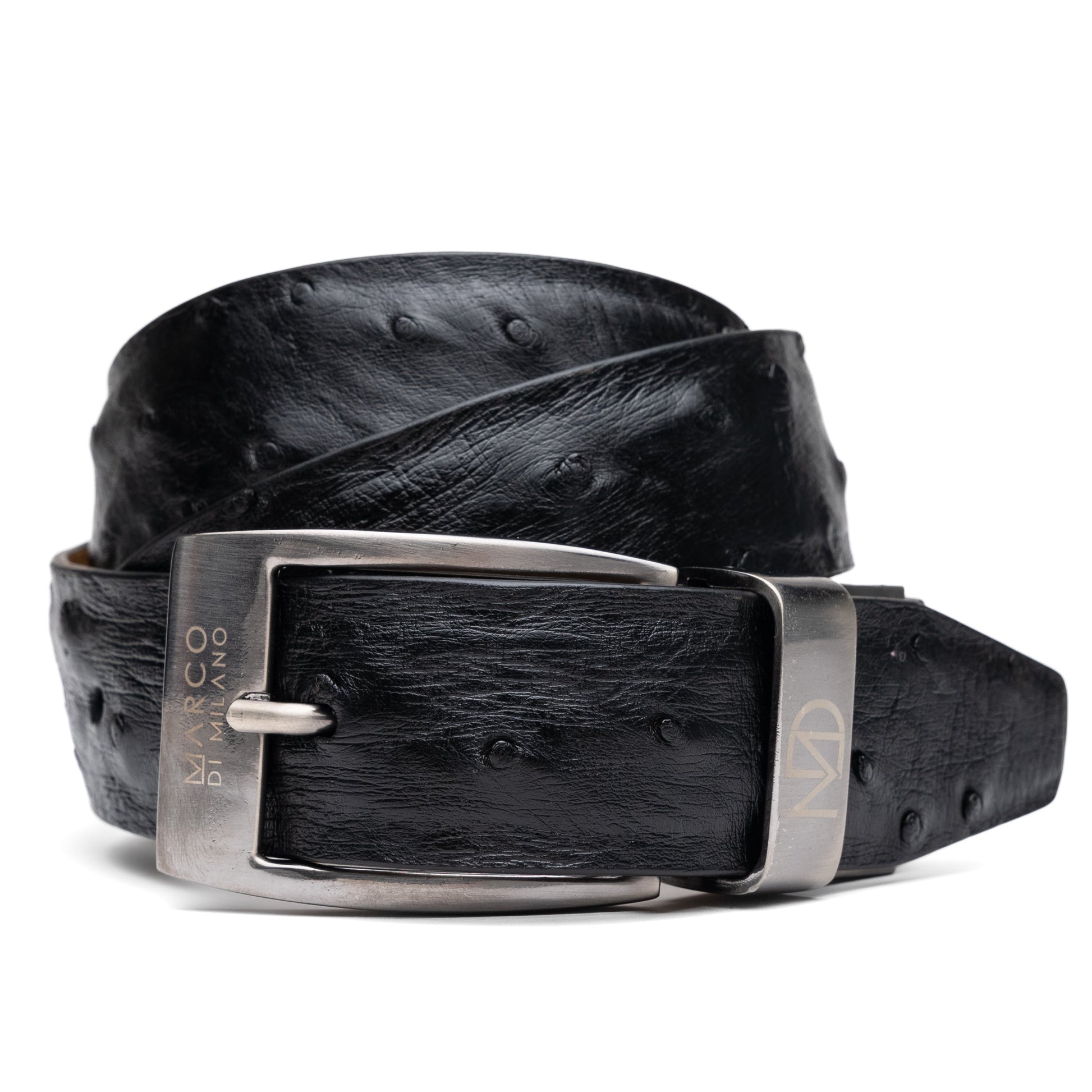 The Domenico Belt Black by Marco Di Milano features black ostrich leather, a silver buckle, and the "MARCO DI MILANO" logo on the metal loop—a sophisticated accessory from the luxury brand Marco Di Milano.