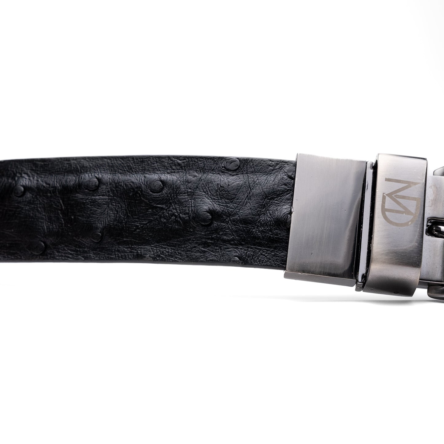 The Domenico Belt Black by Marco Di Milano features black ostrich leather, a silver buckle, and the "MARCO DI MILANO" logo on the metal loop—a sophisticated accessory from the luxury brand Marco Di Milano.
