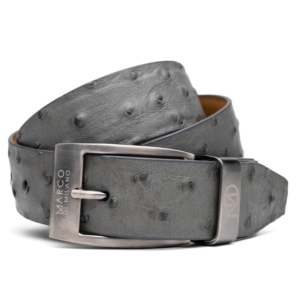 The Domenico Belt Gray by Marco Di Milano is crafted from grey ostrich leather and features a silver buckle engraved with "Marco Di Milano" and the "MD" logo, reflecting the brand's luxurious craftsmanship. Shown coiled on a white background.