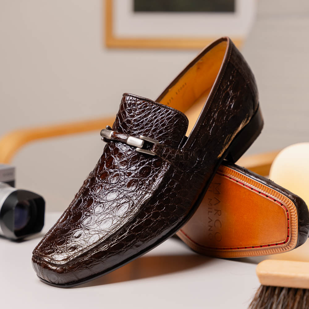The Fabro-Tin Brown loafers by Marco Di Milano feature dark brown genuine alligator leather, metal bit detail, tan leather soles, and square toes—a true statement in luxury men's footwear.