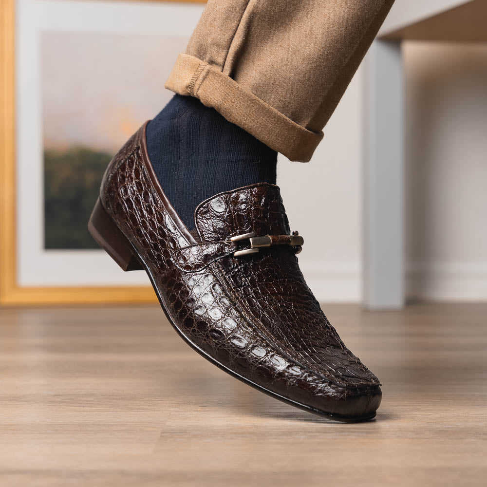 The Fabro-Tin Brown loafers by Marco Di Milano feature dark brown genuine alligator leather, metal bit detail, tan leather soles, and square toes—a true statement in luxury men's footwear.