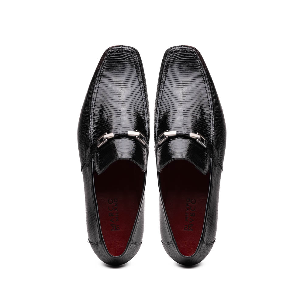 A pair of Marco Di Milano Fabro-Liz Black genuine lizard loafers, featuring textured leather, metal accents, and brown soles—one upright, the other on its side showing the luxury men's shoes branding on the sole.