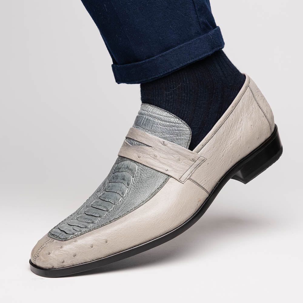 A pair of Marco Di Milano Fangio Gray formal slip-on dress shoes with textured leather and a hand-painted finish, one upright and the other on its side displaying the sole.