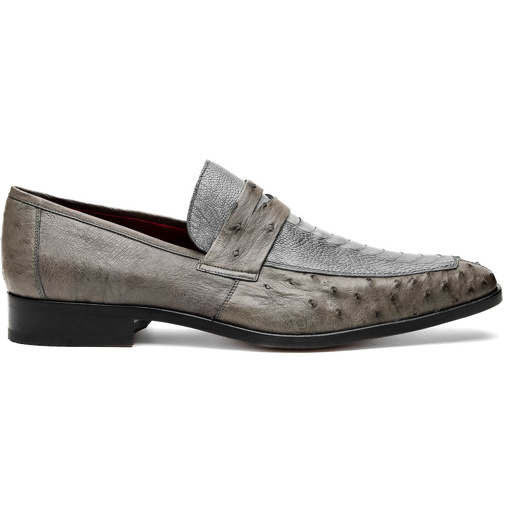 The Fangio Serpentine Gray by Marco Di Milano features gray textured leather in classic penny loafer style, with detailed stitching and tan leather soles—one shoe upright, one on its side—to showcase refined craftsmanship.