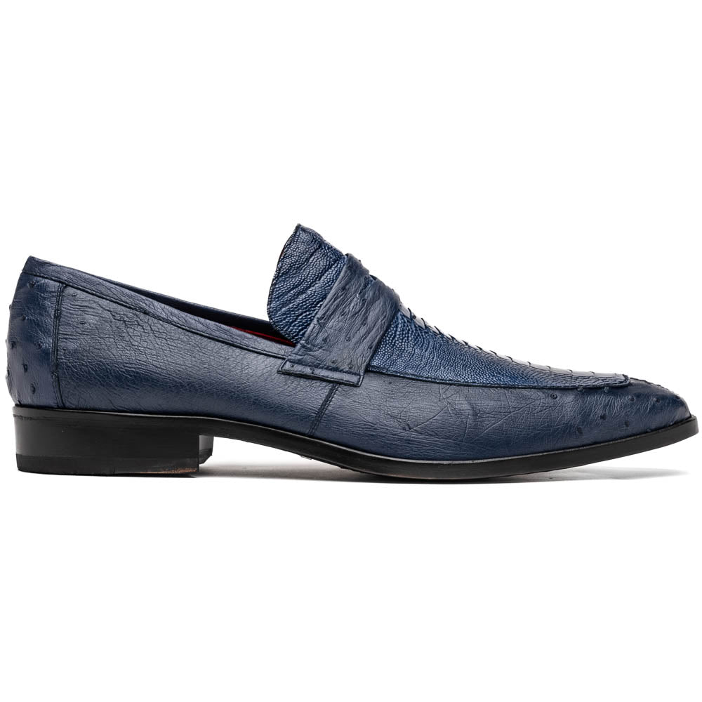 The Marco Di Milano Fangio Denim Blue features genuine ostrich loafers with textured blue uppers and red lining—one upright, one on its side displaying the sole—a standout addition to any luxury men’s footwear collection.