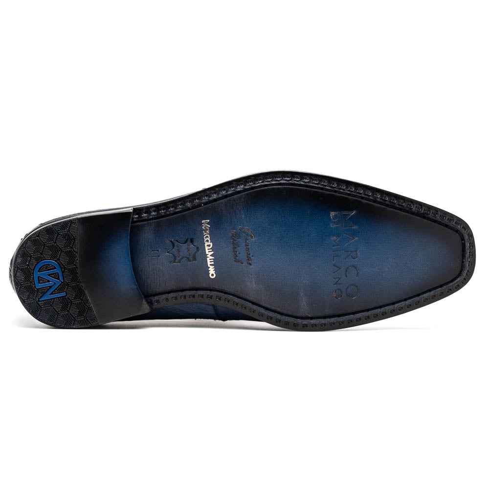 The Marco Di Milano Fangio Denim Blue features genuine ostrich loafers with textured blue uppers and red lining—one upright, one on its side displaying the sole—a standout addition to any luxury men’s footwear collection.