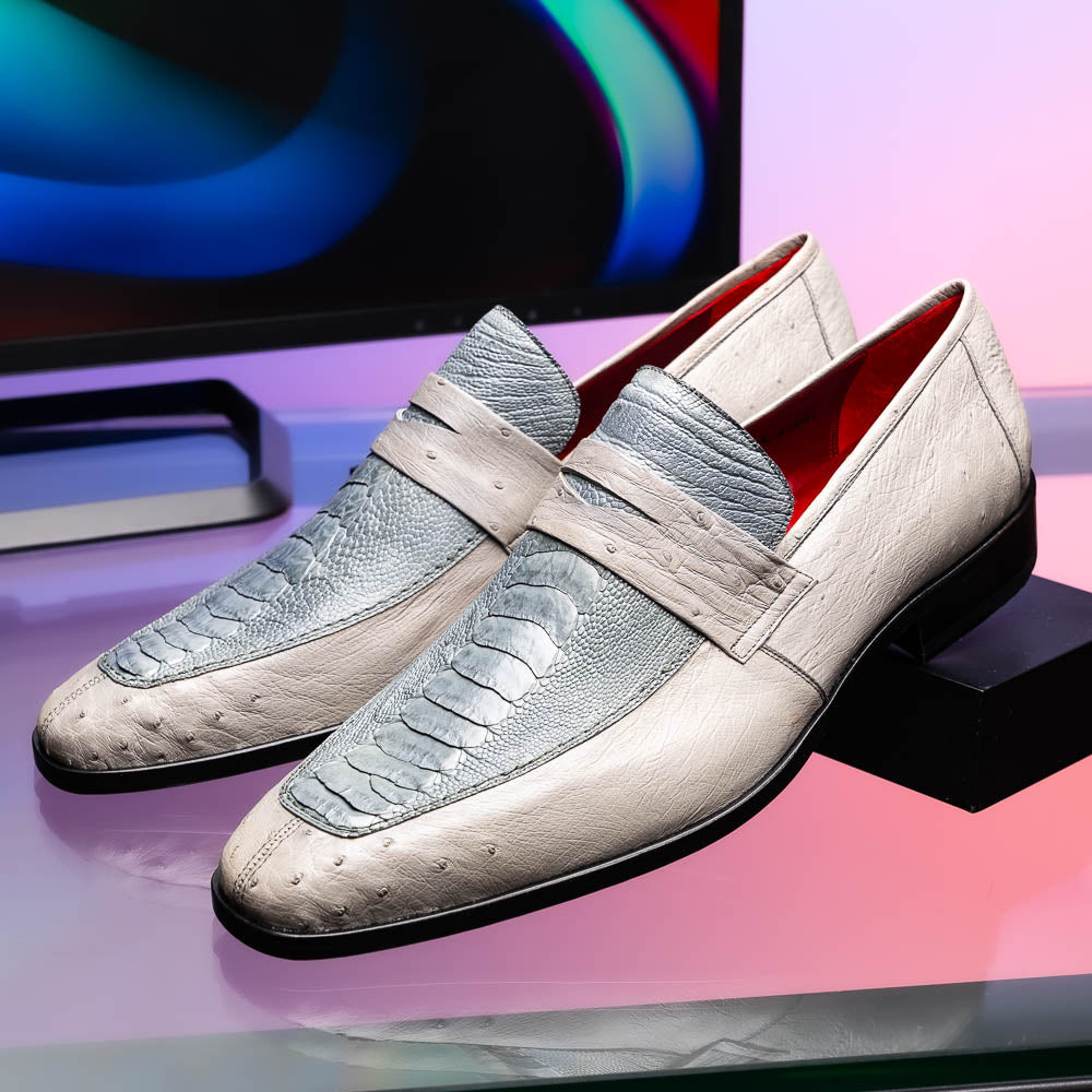 A pair of Marco Di Milano Fangio Gray formal slip-on dress shoes with textured leather and a hand-painted finish, one upright and the other on its side displaying the sole.