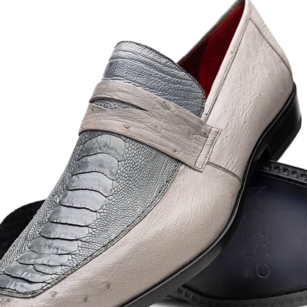 A pair of Marco Di Milano Fangio Gray formal slip-on dress shoes with textured leather and a hand-painted finish, one upright and the other on its side displaying the sole.
