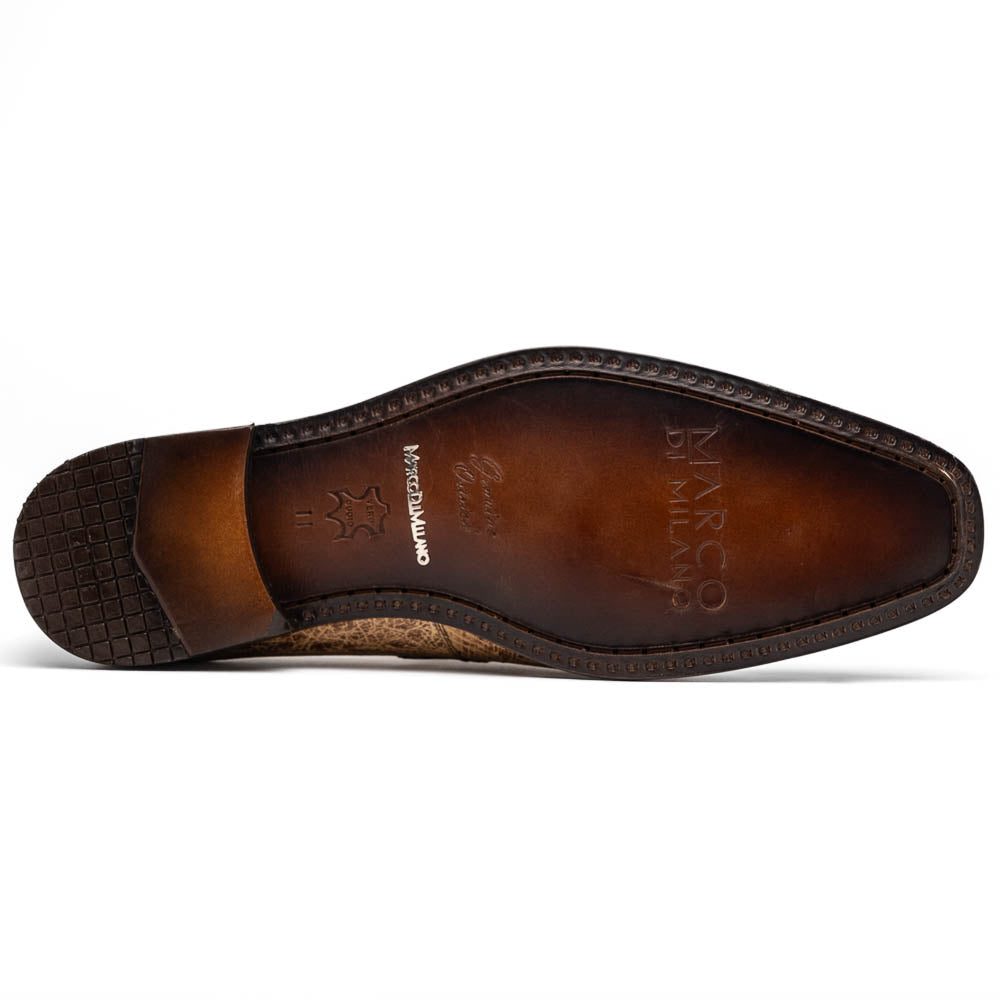 The Fangio Orix by Marco Di Milano: tan textured genuine ostrich loafers with dark brown soles, one upright and one on its side to display the sole—luxury men's shoes with hand-painted finishes.