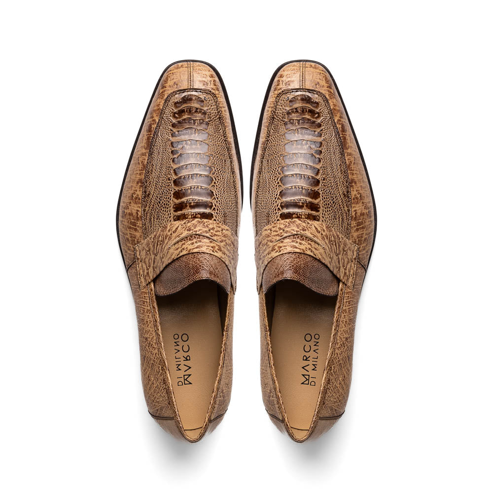 The Fangio Orix by Marco Di Milano: tan textured genuine ostrich loafers with dark brown soles, one upright and one on its side to display the sole—luxury men's shoes with hand-painted finishes.