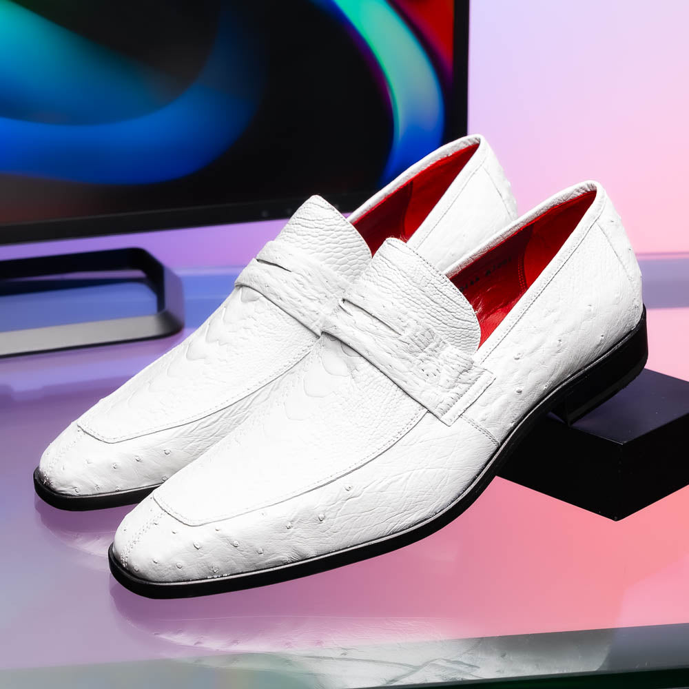 The Marco Di Milano Fangio White men's loafers feature luxurious white genuine ostrich leather with a textured finish; one stands upright, the other on its side to showcase a rich brown leather sole.