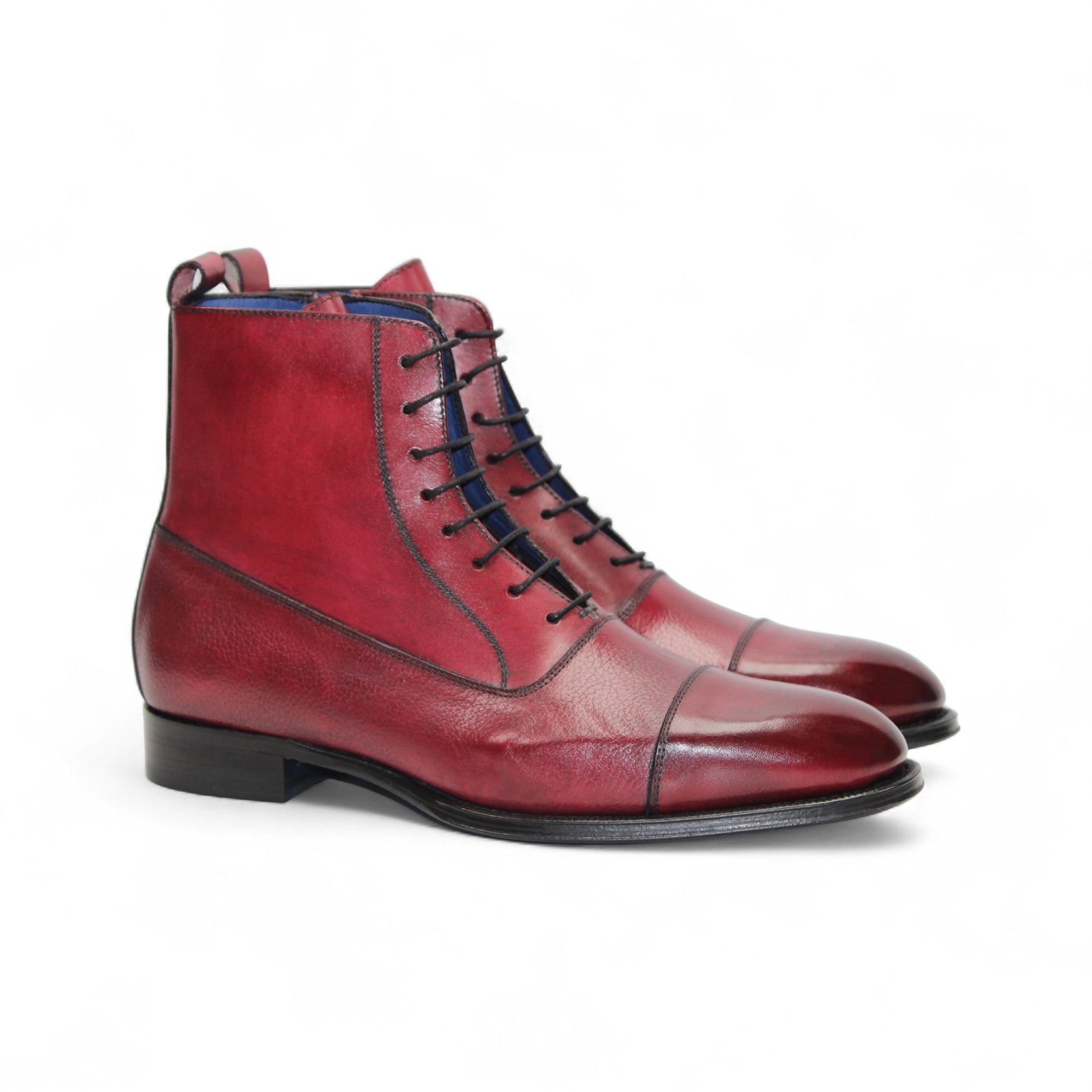 The Emilio Franco Fausto Antique Red, a red leather lace-up ankle boot by Emilio Franco with a low heel, cap toe, and side zipper, is shown in left side profile against a white background.