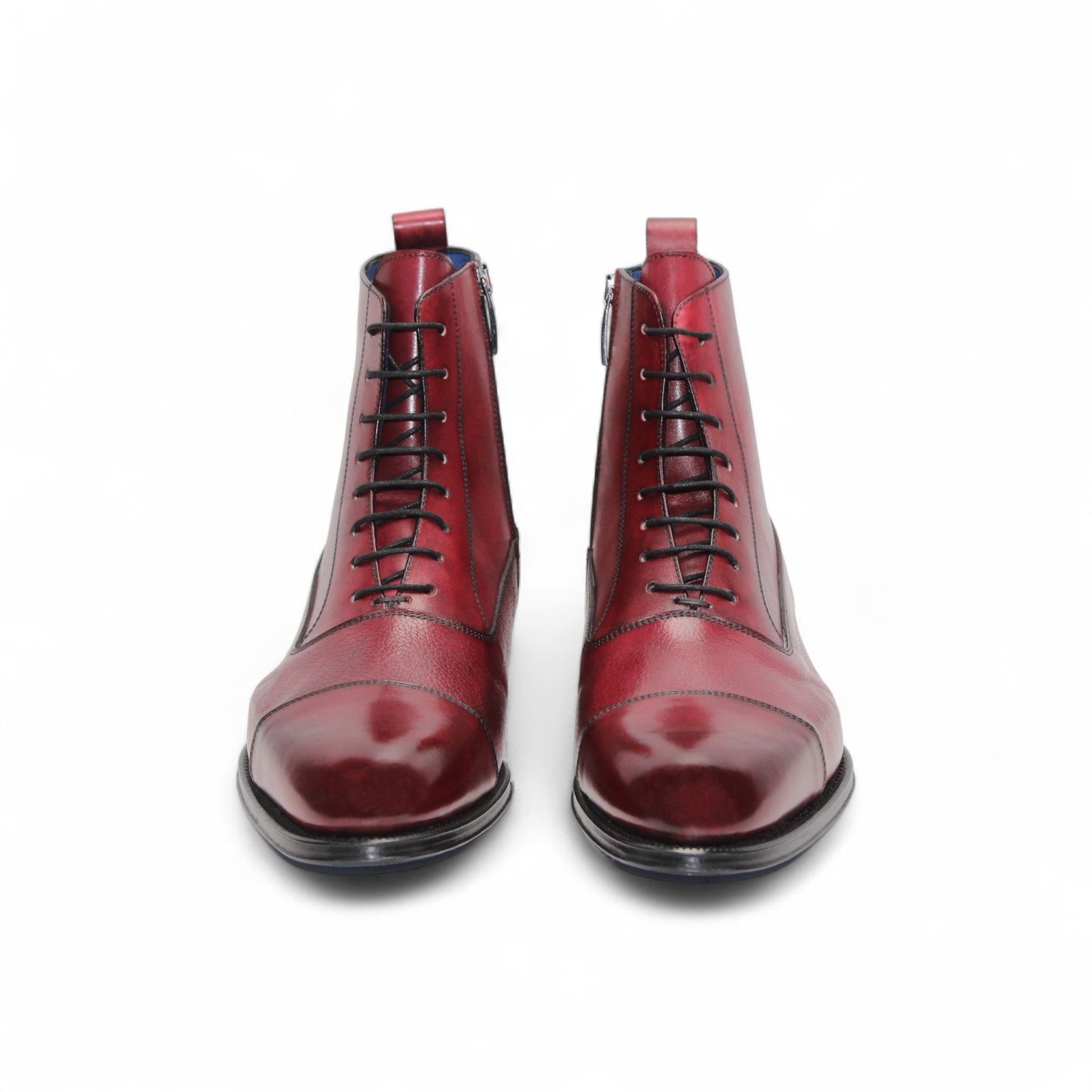 The Emilio Franco Fausto Antique Red, a red leather lace-up ankle boot by Emilio Franco with a low heel, cap toe, and side zipper, is shown in left side profile against a white background.