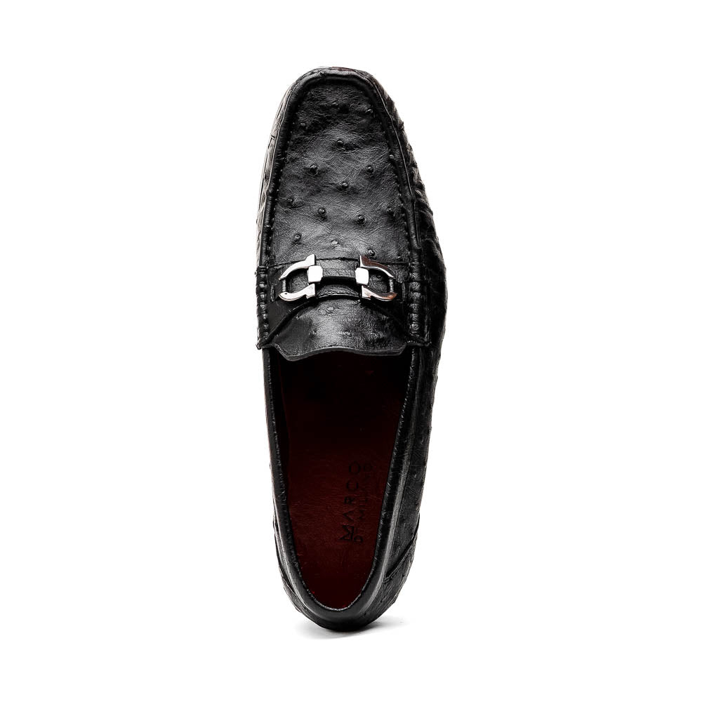 The Marco Di Milano Ferrioni Black: luxury men's loafers in genuine ostrich leather with metal buckles and brown soles, shown both upright and on their side to highlight the branding.
