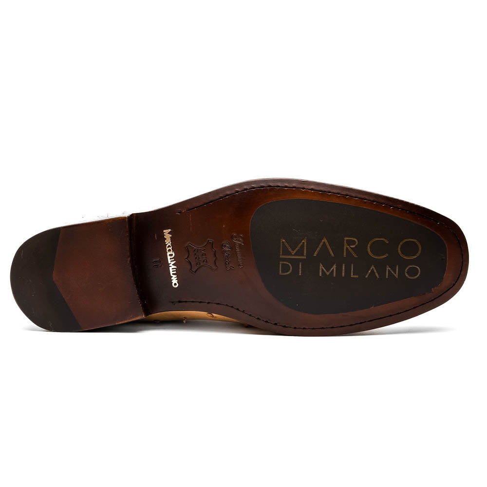 The Marco Di Milano Ferrioni Orix is a pair of genuine beige ostrich loafers with a classic bit buckle, one upright and one on its side showing the insole logo—timeless luxury men's footwear.