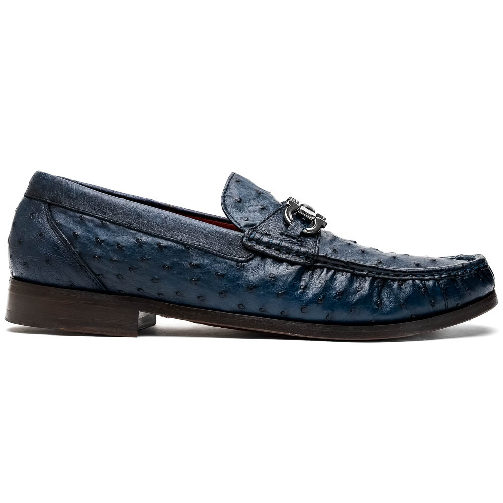 A pair of luxury men's shoes: Ferrioni Navy loafers by Marco Di Milano in genuine ostrich leather, featuring classic bit detail. One shoe is upright, the other shows the sole with "Marco Di Milano" branding.