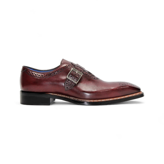 The Emilio Franco Filippo Burgundy is a single burgundy leather dress shoe with a buckle strap, brogue detailing, and a low black heel, crafted from genuine leather to showcase Italian craftsmanship.