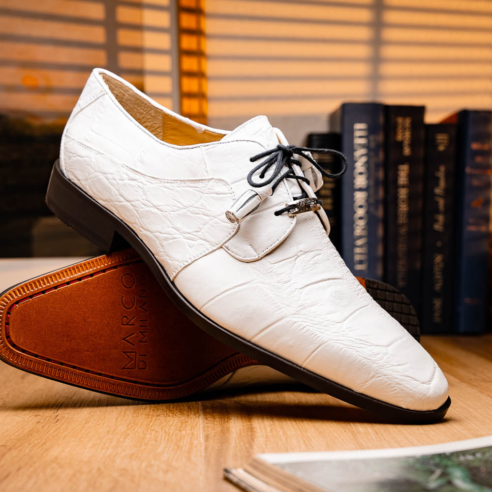 The Fitipaldi White by Marco Di Milano is a luxury men's dress shoe in white leather with black laces and an orange-brown sole, featuring the brand's signature style—ideal for those seeking standout footwear.