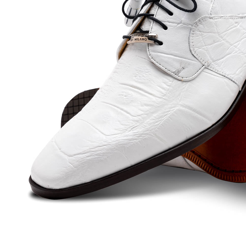 The Fitipaldi White by Marco Di Milano is a luxury men's dress shoe in white leather with black laces and an orange-brown sole, featuring the brand's signature style—ideal for those seeking standout footwear.