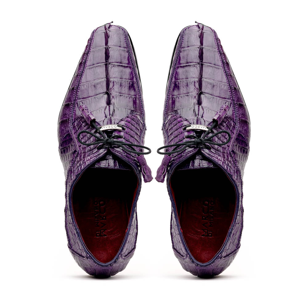 The Marco Di Milano Cancun Purple is a luxurious pair of derby shoes crafted from genuine hornback caiman crocodile leather, hand-painted in purple with black laces—one shown upright, the other displaying a tan branded sole.