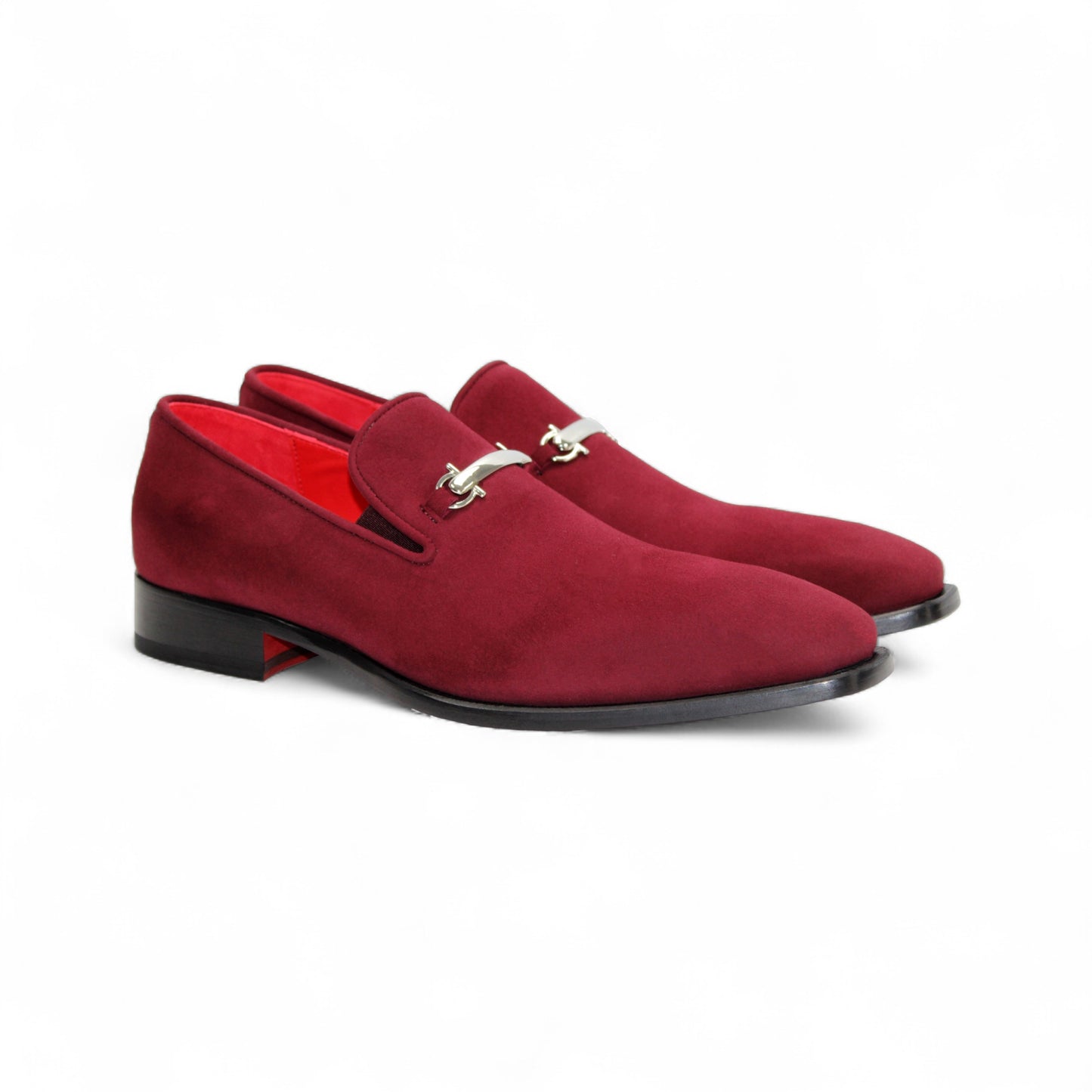 The Emilio Franco Francesco Burgundy, a handcrafted Italian loafer in red suede with a black sole and a subtle silver accent near the opening, is displayed on a white background.