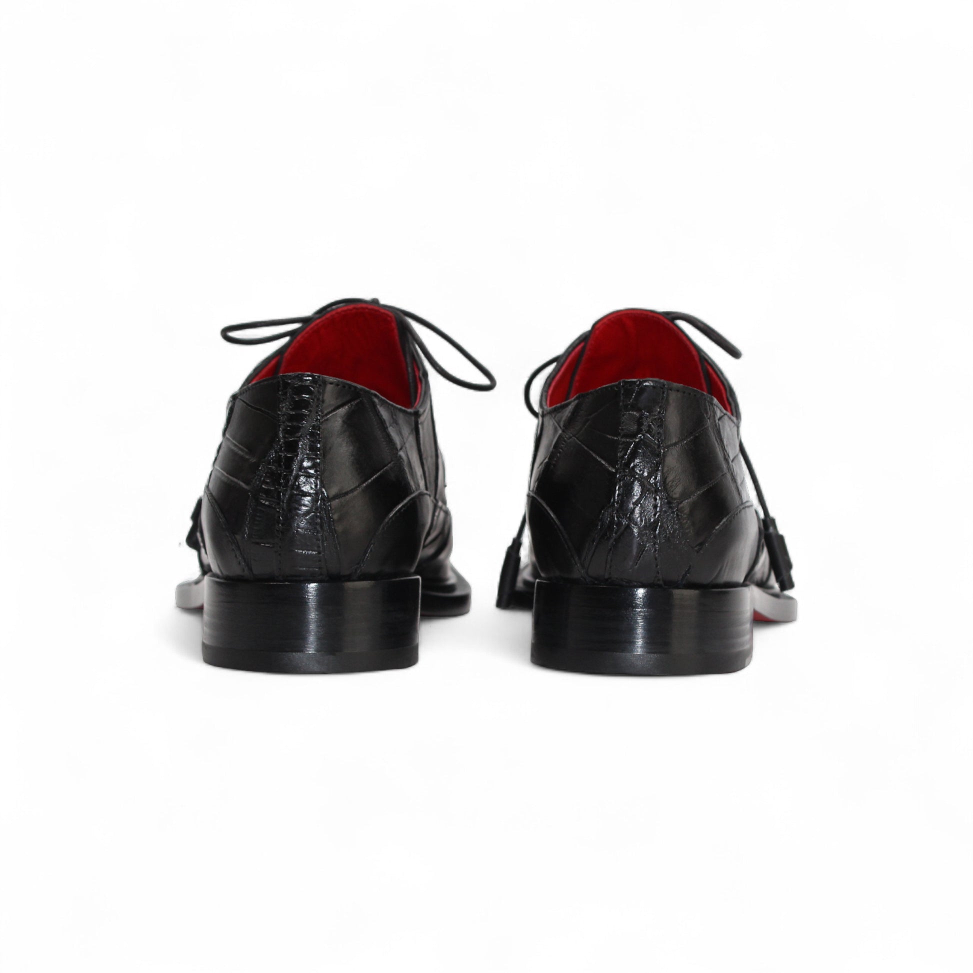The Fennix Frank Black by Fennix of Italy is a men's black leather dress shoe with a crocodile texture, lace-up closure, red lining, and a squared toe—luxury footwear designed to make a statement.