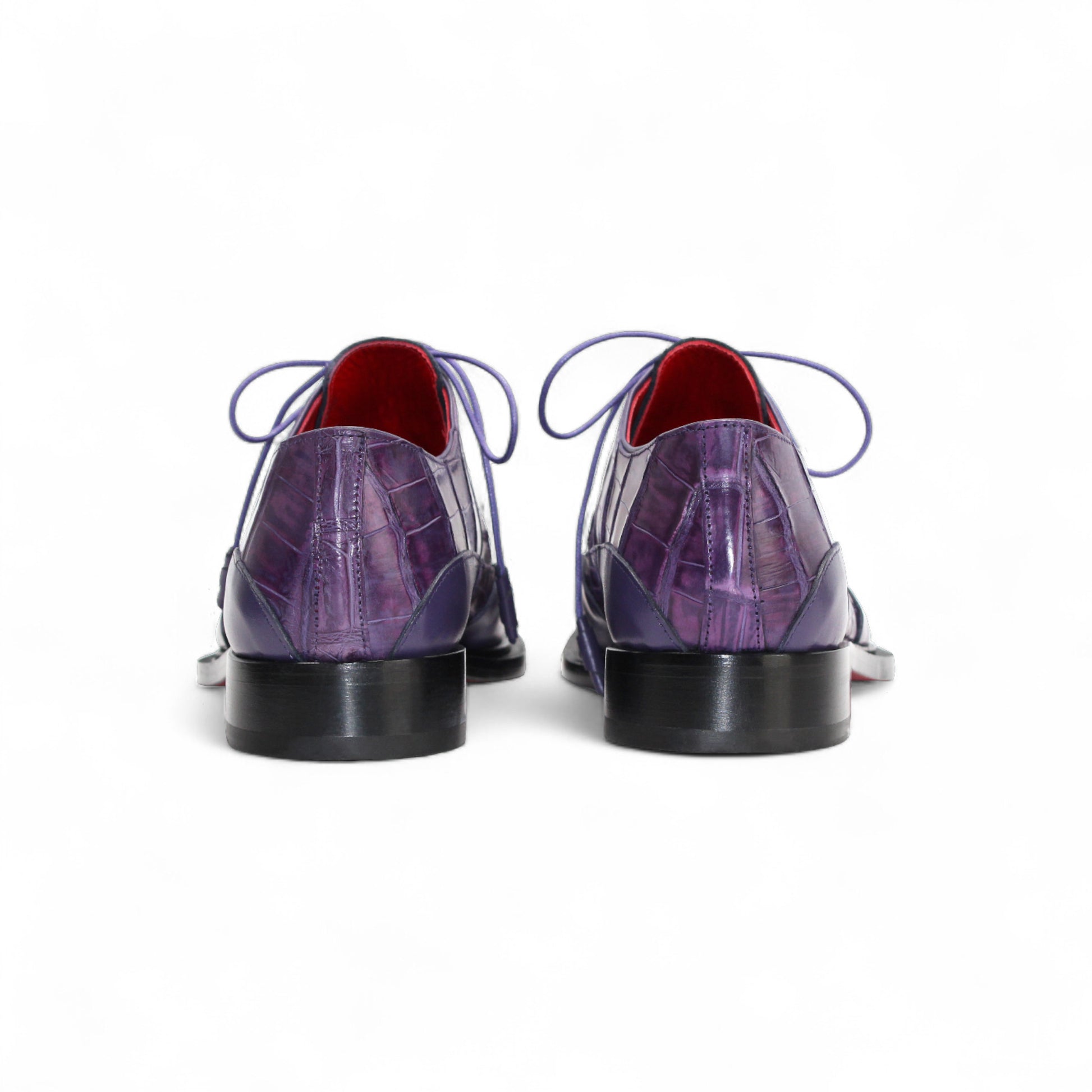 The Fennix Frank Purple by Fennix of Italy is a purple genuine alligator lace-up shoe featuring Italian craftsmanship, a low heel, and a polished black leather sole, shown in profile against a white background.