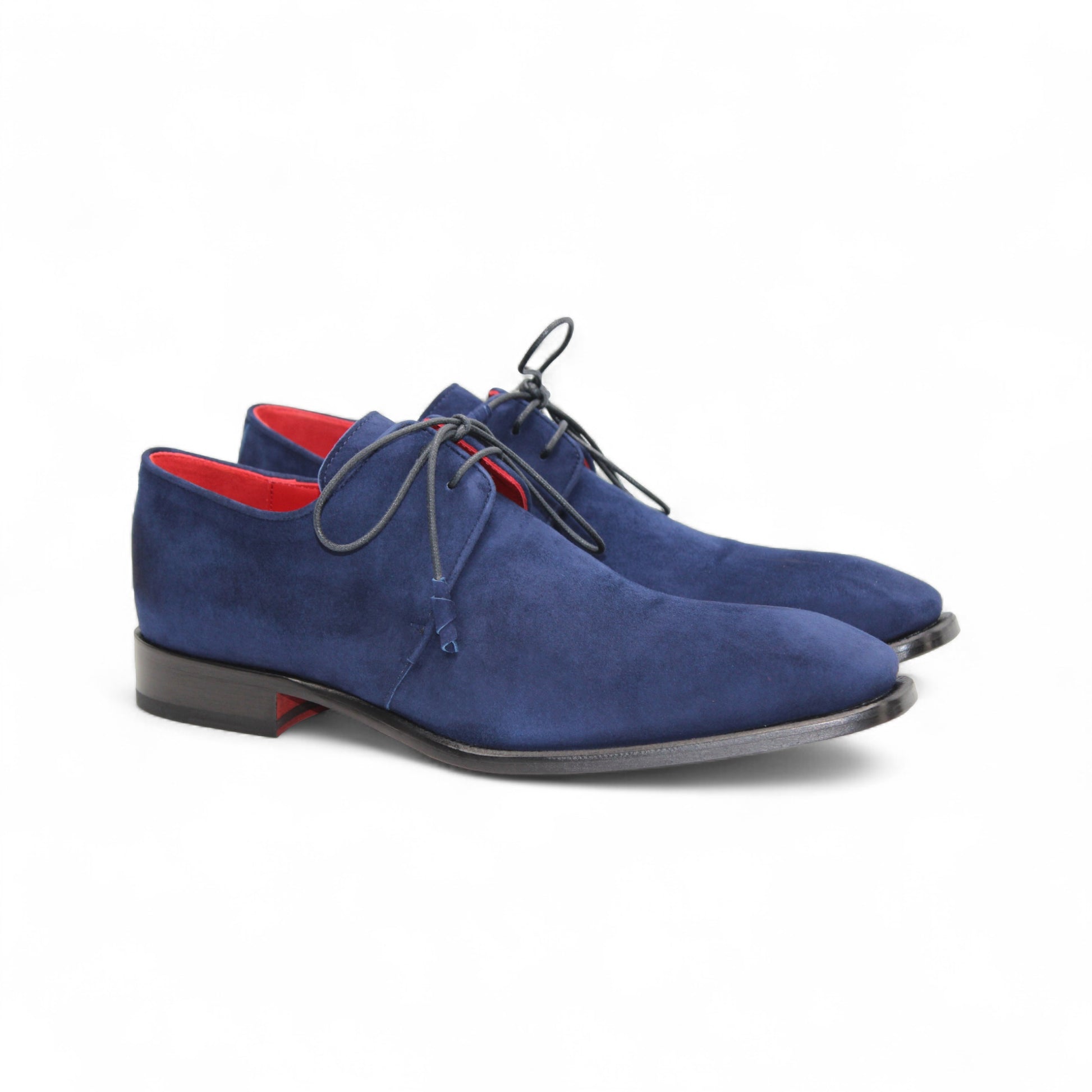 The Emilio Franco Gabriele Navy men’s dress shoe features dark blue Italian suede, laces, a black leather sole, and a red inner lining, shown in profile on a white background.