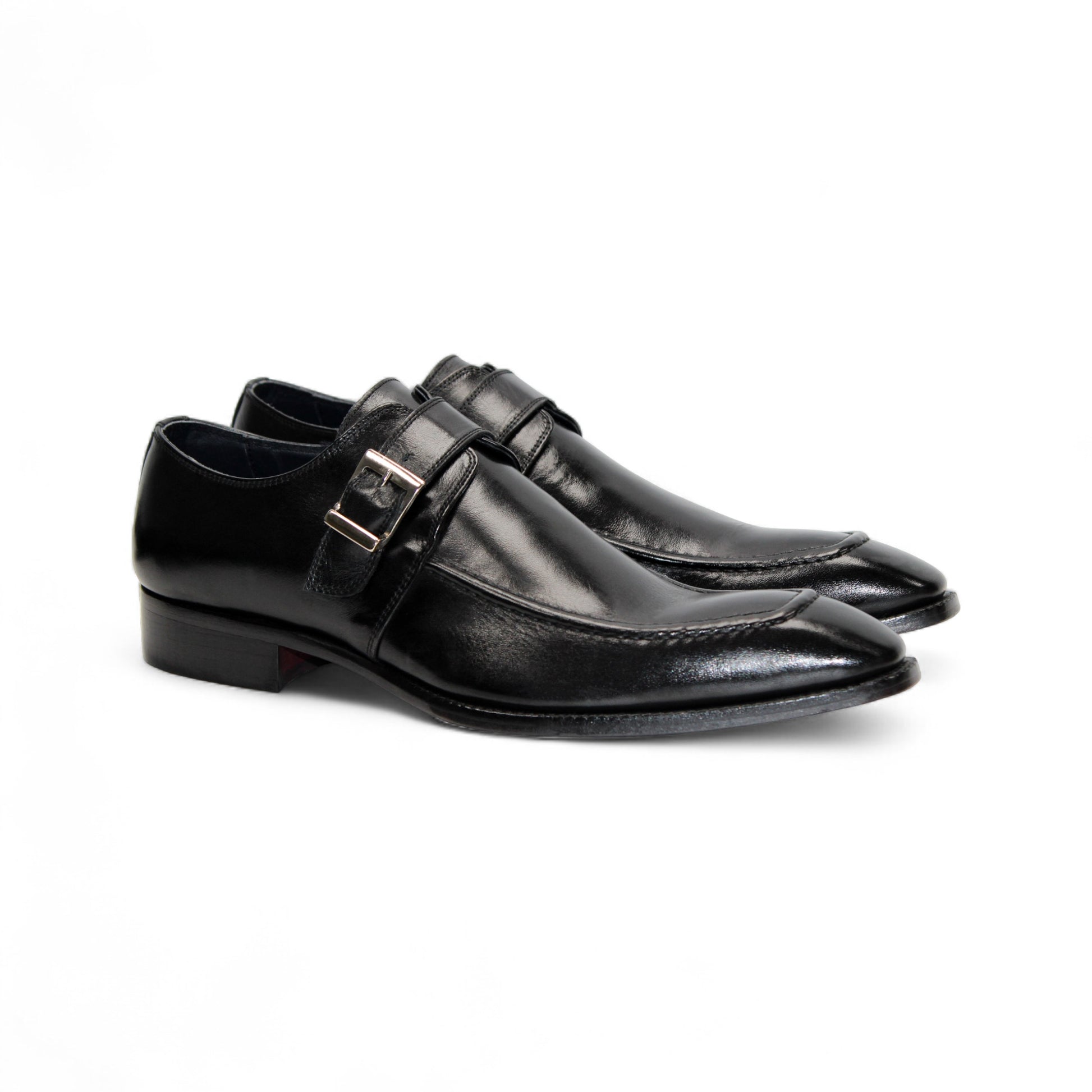 The Duca Di Matiste Duca Garda Black is a genuine black leather dress shoe with a single side buckle and low heel, ideal for the modern wardrobe, shown against a white background.