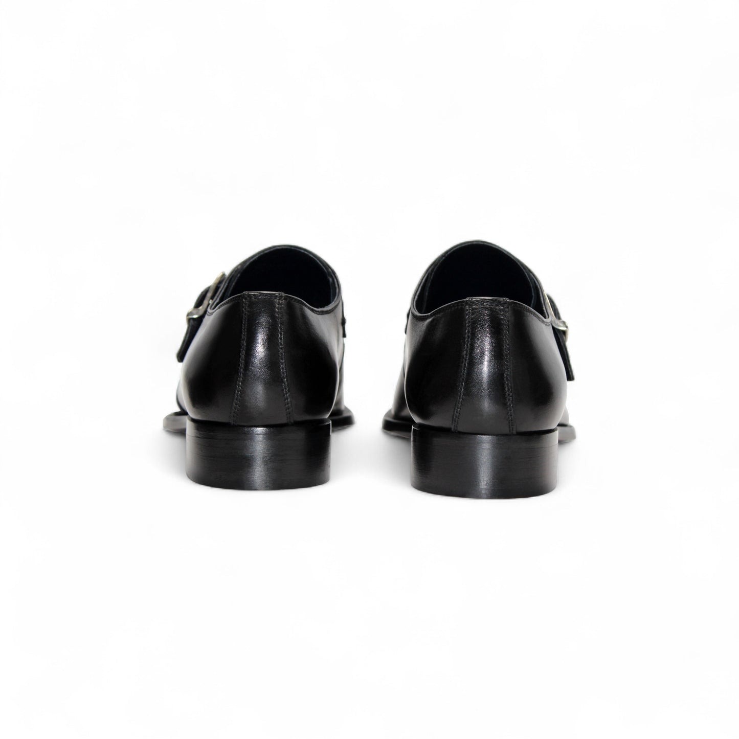 The Duca Di Matiste Duca Garda Black is a genuine black leather dress shoe with a single side buckle and low heel, ideal for the modern wardrobe, shown against a white background.