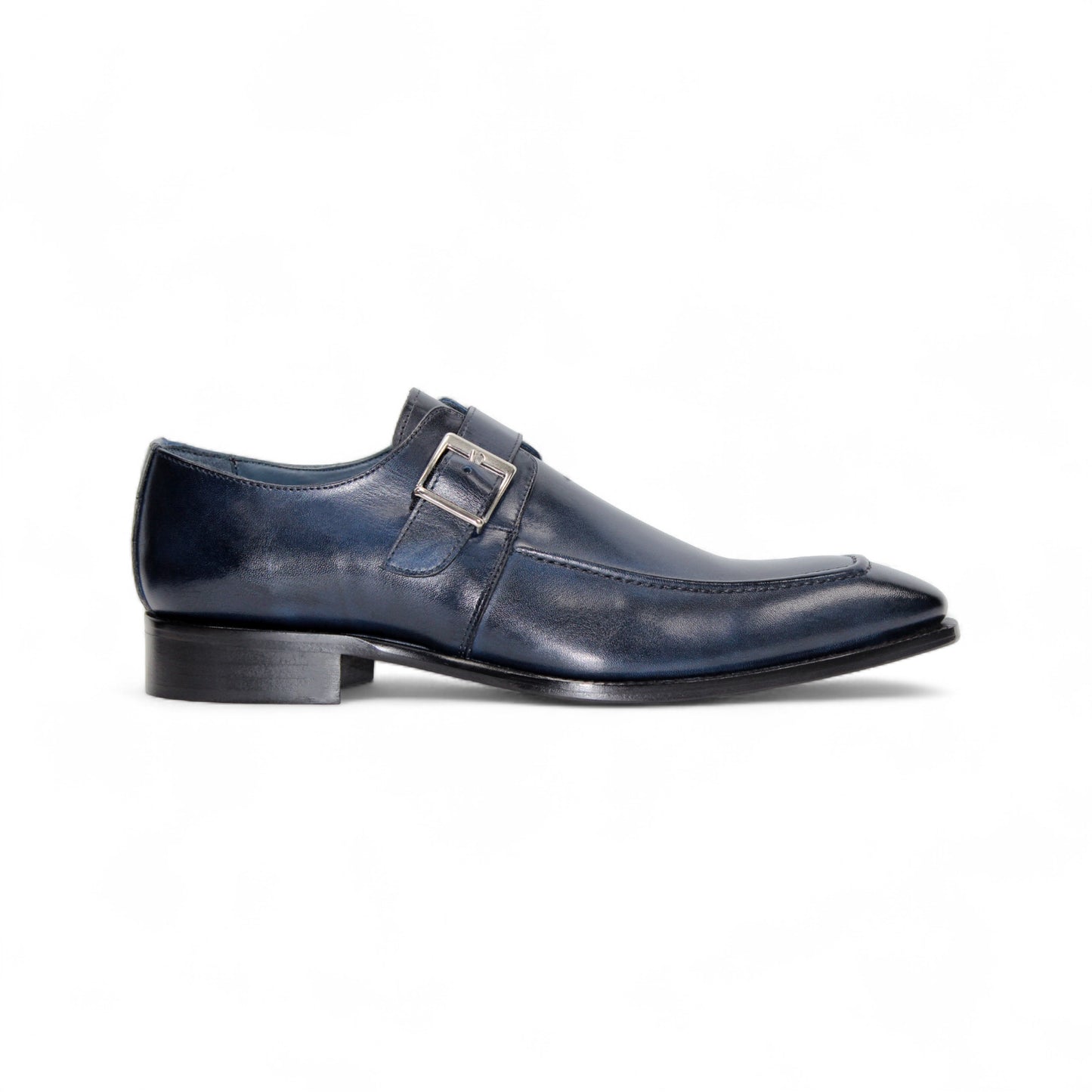 The Duca Di Matiste Duca Garda Navy is a handcrafted Italian leather shoe in dark blue, featuring a side buckle, low heel, and pointed toe, shown against a white background.