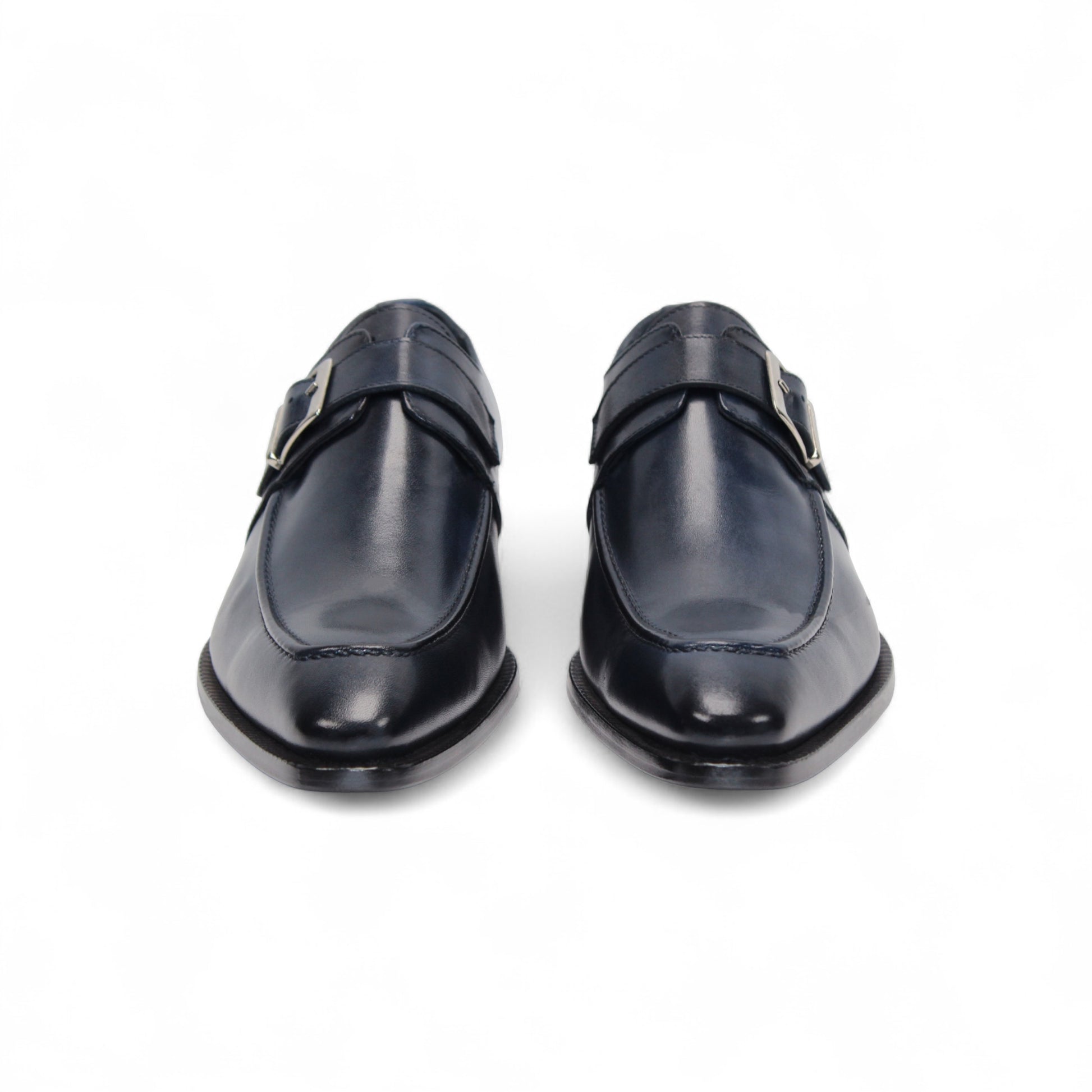 The Duca Di Matiste Duca Garda Navy is a handcrafted Italian leather shoe in dark blue, featuring a side buckle, low heel, and pointed toe, shown against a white background.