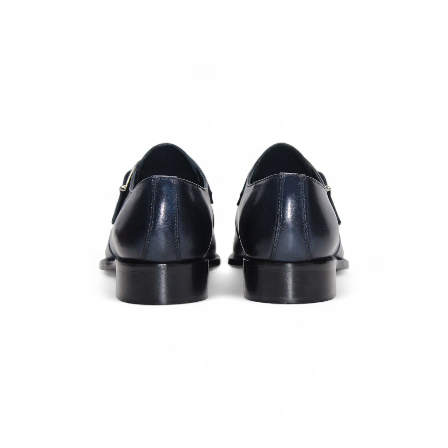 The Duca Di Matiste Duca Garda Navy is a handcrafted Italian leather shoe in dark blue, featuring a side buckle, low heel, and pointed toe, shown against a white background.