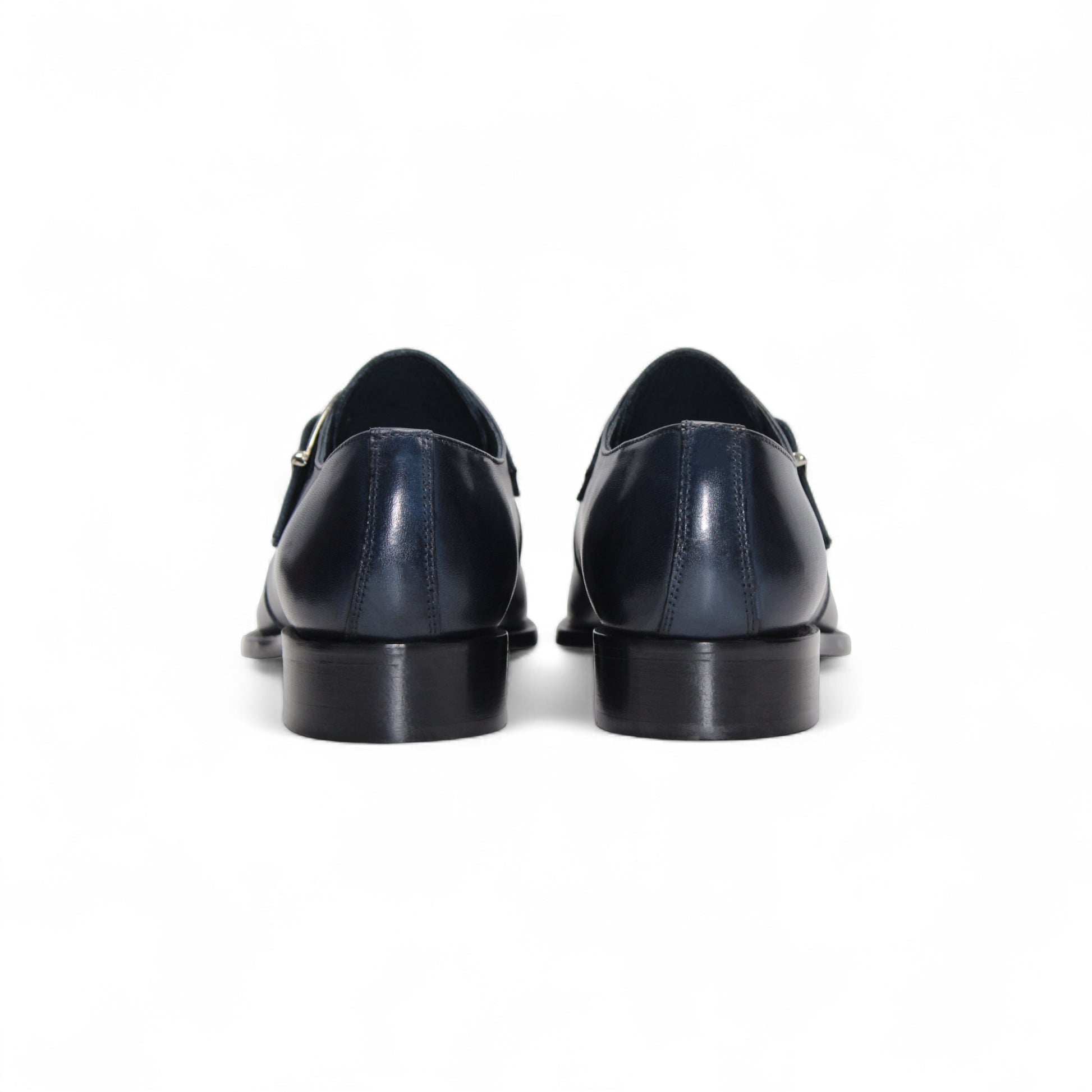 The Duca Di Matiste Duca Garda Navy is a handcrafted Italian leather shoe in dark blue, featuring a side buckle, low heel, and pointed toe, shown against a white background.