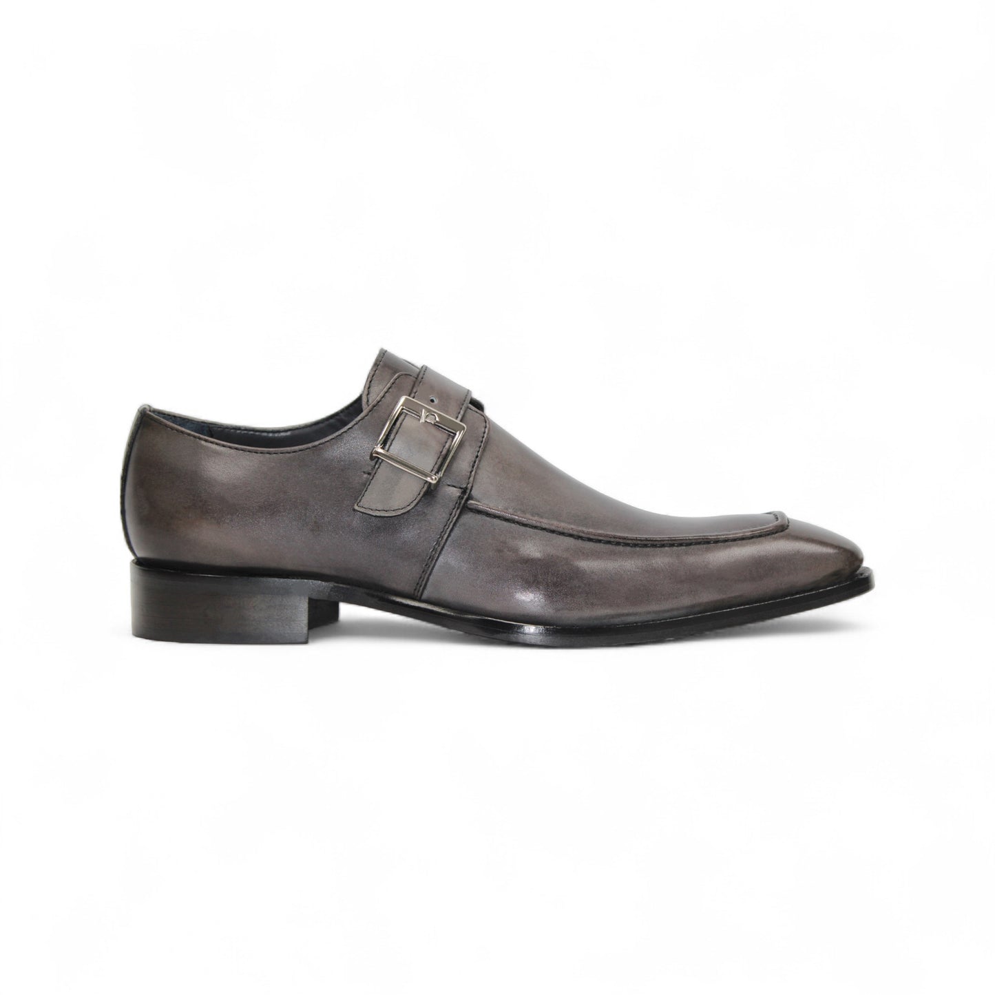 The Duca Di Matiste Duca Garda Grey—a genuine leather dress shoe with pointed toe, low heel, and side buckle—is an elegant choice for any modern wardrobe, shown here in gray on a white background.